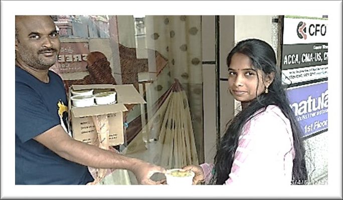 Food being offered to a young woman