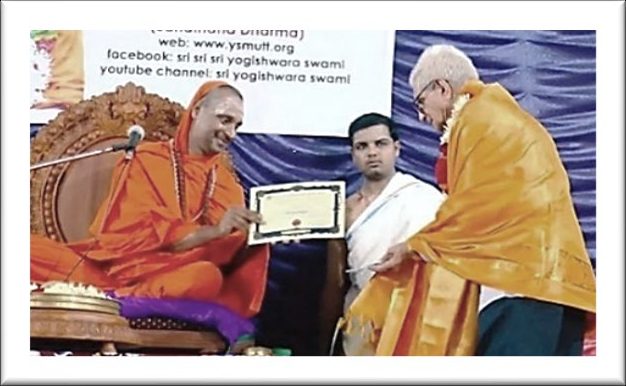 Sri Yogi honouring a writer